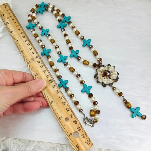 Beautiful weighted bohemian chic long statement necklace